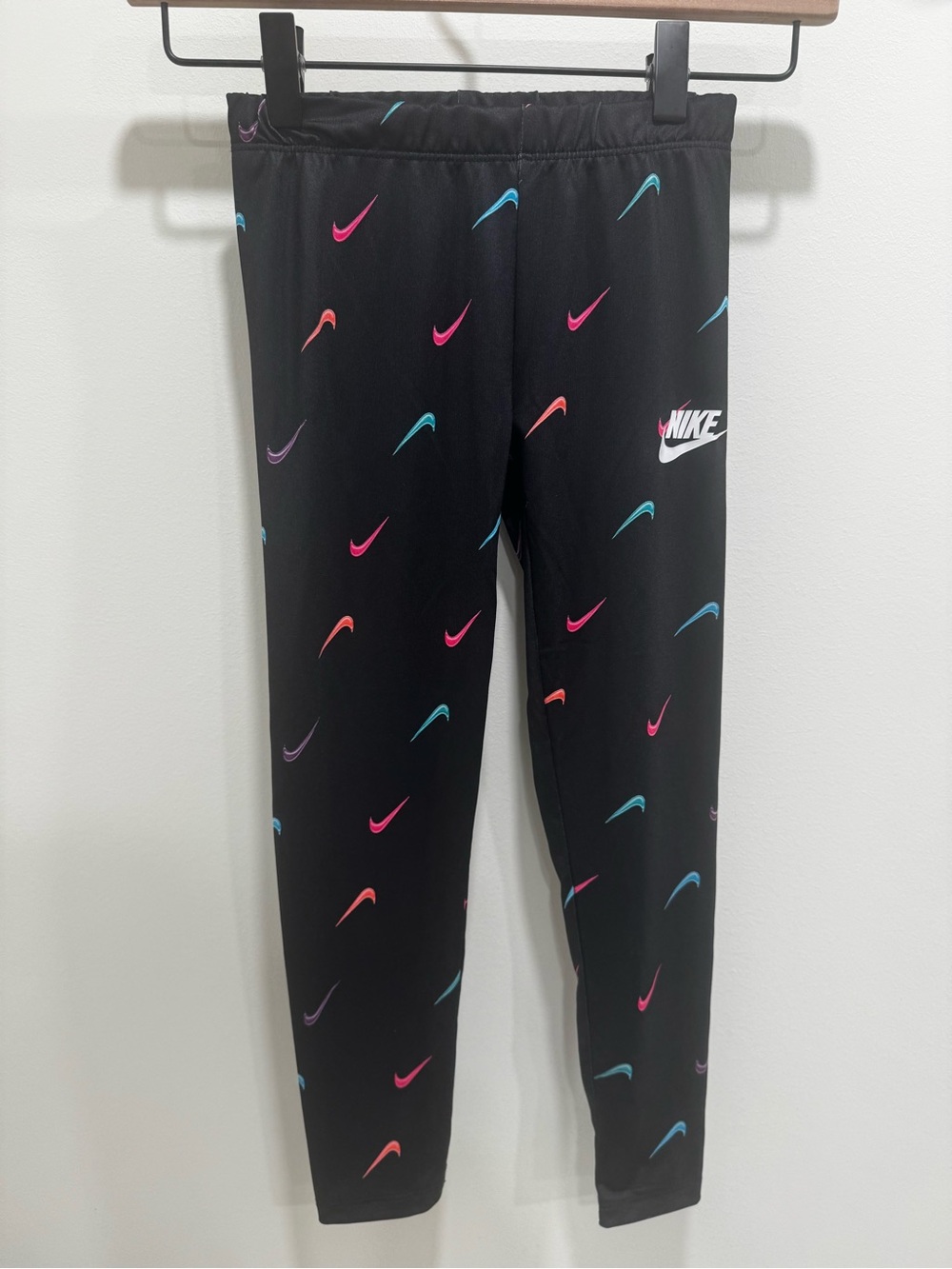 Nike Kids Black Leggings with Pink, Teal & Coral Swoosh Print